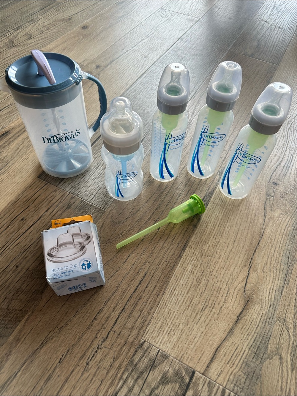Lot of Dr. Brown’s Bottles and Formula Mixing Pitcher and Sippy Sprouts